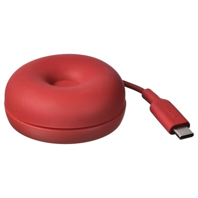 Wireless red donut charger VÄSTMÄRKE. Soft, foldable with usb-c cable.