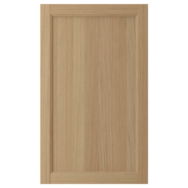 VEDHAMN light wooden cabinet door with natural oak grain and solid oak frame.