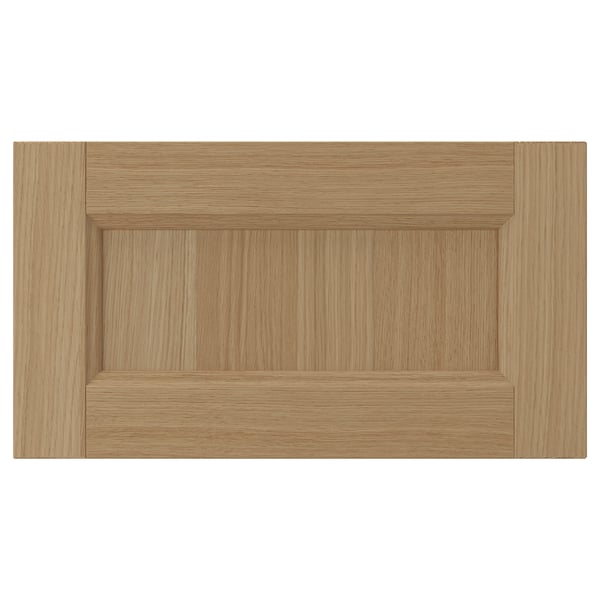 Light brown VEDHAMN cabinet door, oak frame & panel.