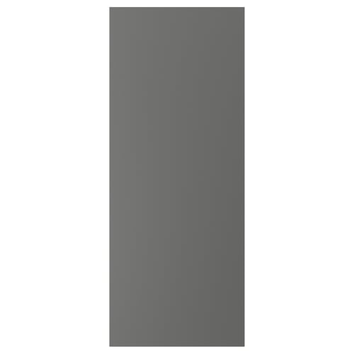A VOXTORP kitchen cabinet door in dark grey with a smooth, minimalist design and integrated handles.