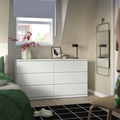 STORKLINTA Cómoda de 6 cajones, blanco/Función de anclaje/desbloqueo, 140x48x75 cm