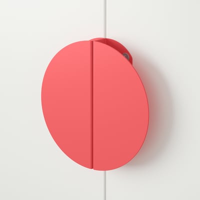 Red circular handle, smooth finish, mounted on a wall, high quality design.