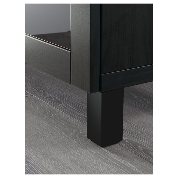 Modular storage furniture corner, exhibiting sleek design and sturdy build quality. Dark wood finish with clean lines and adjustable shelf.