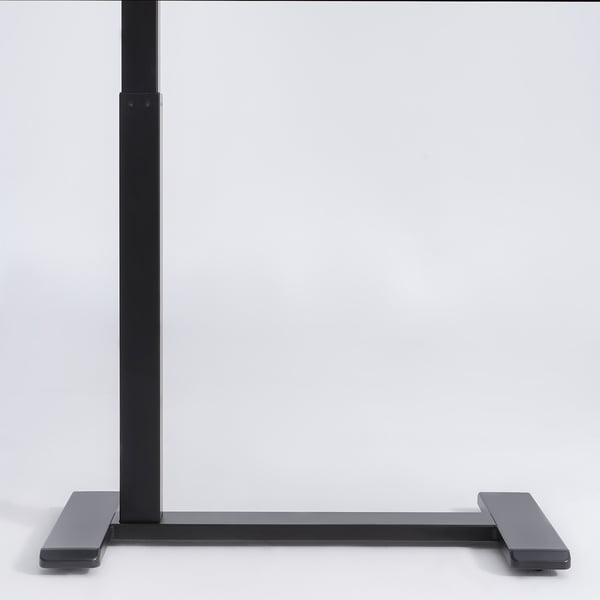 Black height-adjustable table base with gas spring and sturdy, black, adjustable feet.