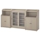 Light beige HAUGA storage unit with glass doors and cabinets. Modern design with open and closed storage. Ensure safety with wall attachment.