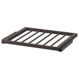 A dark grey KOMPLEMENT trouser hanger, designed with diagonal slats on a steel frame. It a smooth, epoxy powder-coated finish.