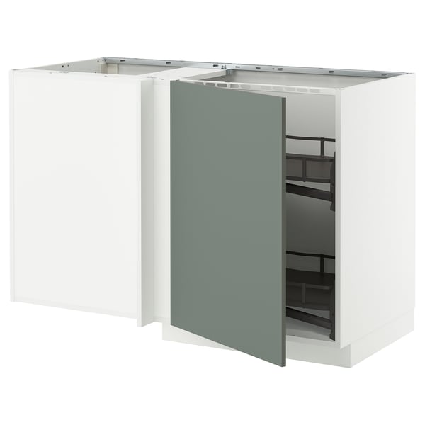 A white METOD corner kitchen cabinet with a green-gray door open, revealing interior shelves.