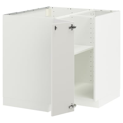 White METOD kitchen cabinet set with glossy finish and metal hinges.