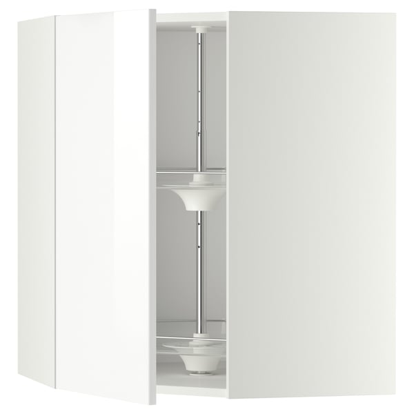 A white high-gloss kitchen cabinet with a carousel unit.