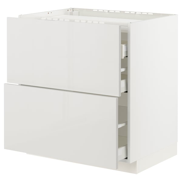White METOD kitchen cabinet with smooth grey drawers and glossy finish.