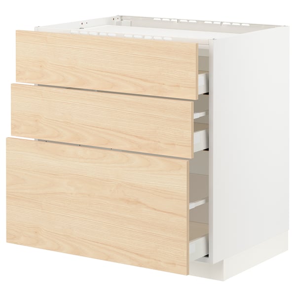 White METOD kitchen unit with light wood drawers, three drawers, modern design.