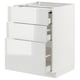 Modern METOD kitchen unit with glossy white drawers, sleek and clean design.