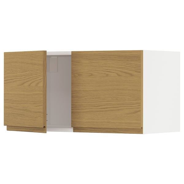 A wooden kitchen cabinet set with a light oak finish and sleek design.
