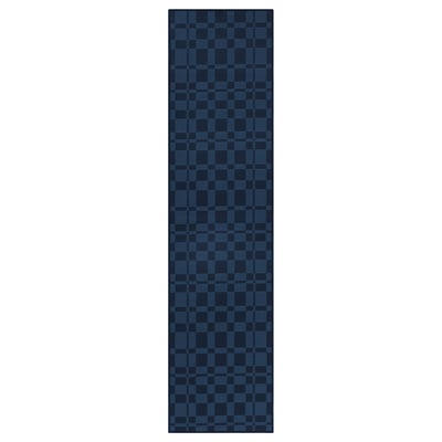 A blue NATTÅG rectangular runner rug with a chequered pattern.