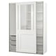 Modern white PAX wardrobe with clear glass doors clothes. Mesh baskets and adjustable shelves. Sleek, sliding door design.