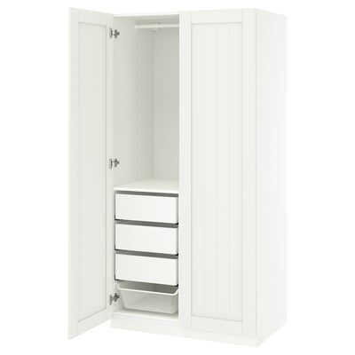 White ikea PAX wardrobe, tall, vertical, open revealing shelves and drawer.