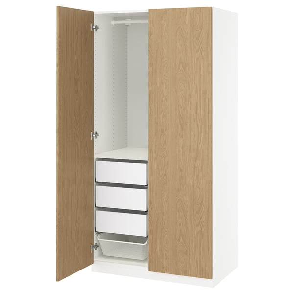Modern white and oak PAX wardrobe, open showing drawers and shelves.