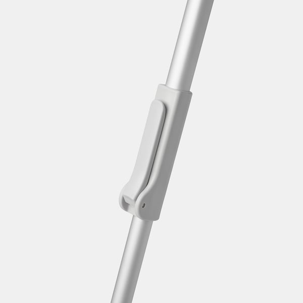Silver telescopic handle with push-button length adjustment, part of a modular cleaning system, shown in a close-up detail.