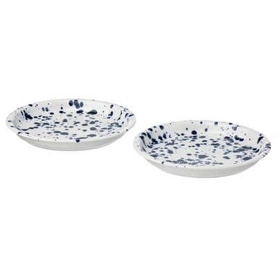 Two white plates with blue speckles, round shape, easy-grip edges, made of stoneware.