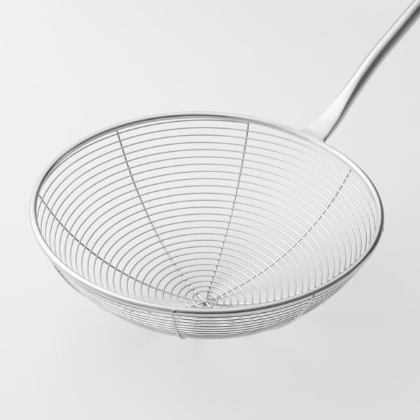 Stainless steel skimmer with long handle for expert cooking.