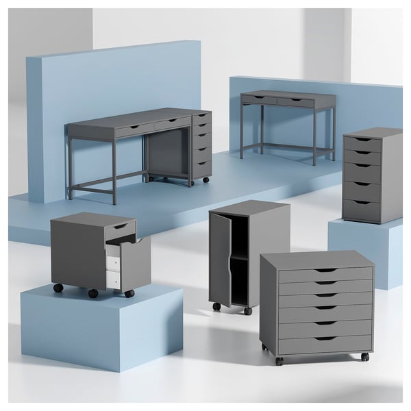 Modern grey office furniture set, featuring desks and file cabinets with minimalist design, displaying a clean look with drawers and casters.
