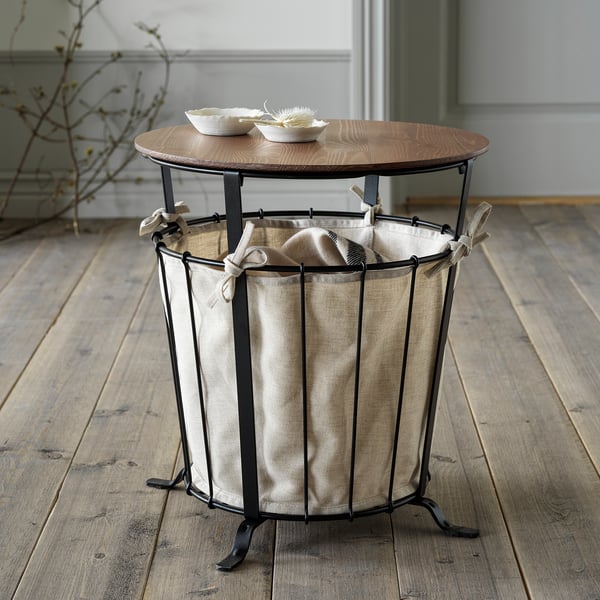 Ängsby storage table: wood top, fabric bag, metal base – perfect for rooms, combines nature & modern.