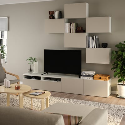 Cosy living room with BESTÅ tv unit, books, decor, and plant.