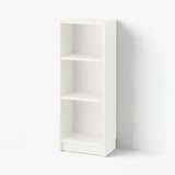 White BILLY bookshelf, tall, three narrow shelves, minimalist design.
