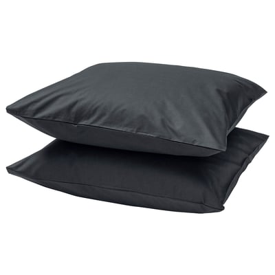 Two dark grey, square-shaped pillows stacked neatly, showcasing a simple and modern design in soft cotton material.