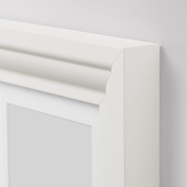 White picture frame with smooth, sturdy edges and clean finish, displayed on a light wall.