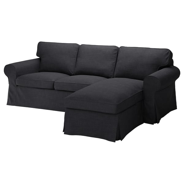 An EKTORP grey fabric sectional sofa with a chaise lounge. It has a modern design with thick cushions and a reversible backrest.