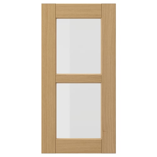 FORSBACKA: light oak wood kitchen cabinet door with glass panel, warm, rectangular design.
