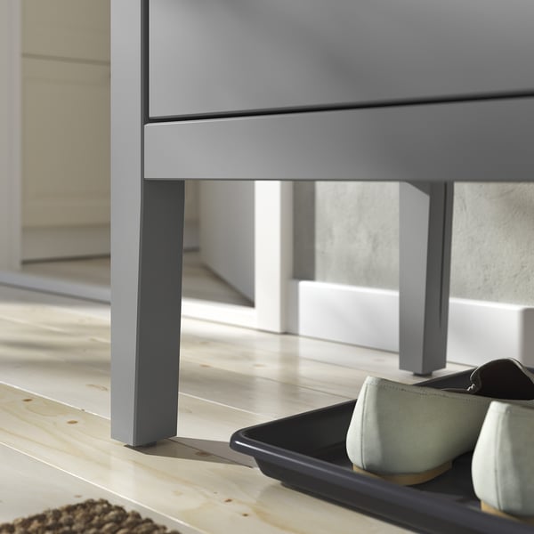 Modern grey GULLABERG bench with sleek drawers and tapered legs, stylish for entryway or bedroom.