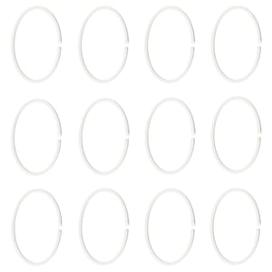 Twelve white oval plastic hoops displayed in rows.