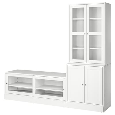 White HAVSTA storage set: tall glass cabinet, wide shelf, sturdy wood.