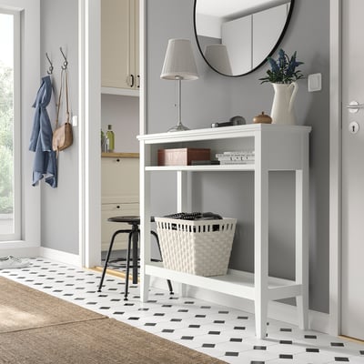 Modern white IDANÄS console table fits narrow spaces, with practical open shelves. A stylish, functional centrepiece.