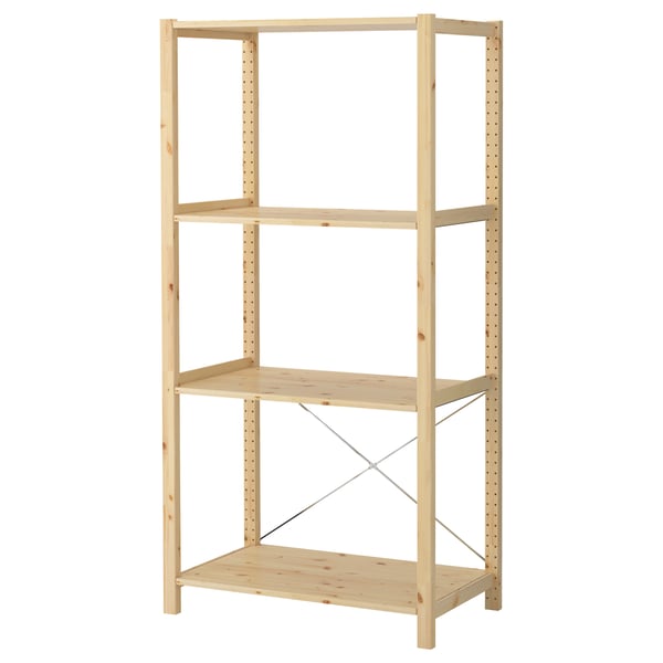 An IVAR storage shelf in natural pine. Its rectangular, has three adjustable shelves, and a simple, sturdy design with steel cross-bracing.