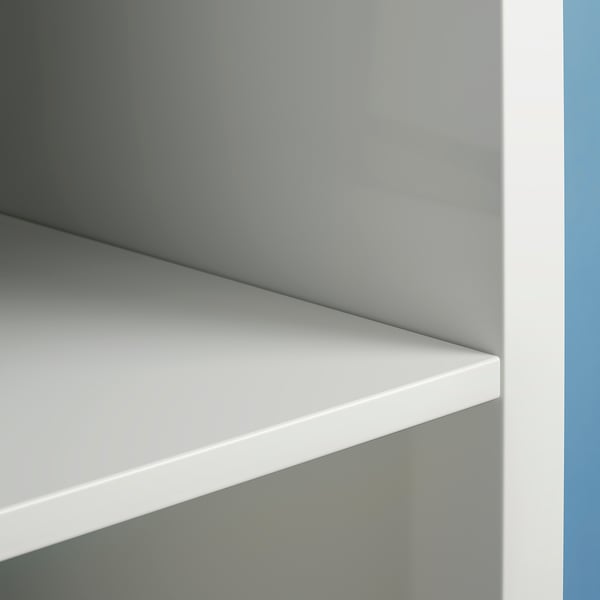 Close-up of KALLAX white shelf, sleek and clean, made from particleboard and acrylic paint.