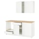 Modern white kitchen set with oak countertop, drawers, and cabinets for storage.