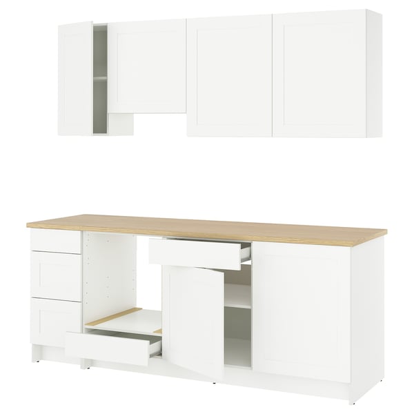 KNOXHULT white kitchen cabinets. Drawers and shelves. Made from melamine, laminate, and plastic edges. Clean, modern design.