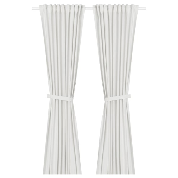 White LENDA curtains, plain, tied with loops, hang straight.