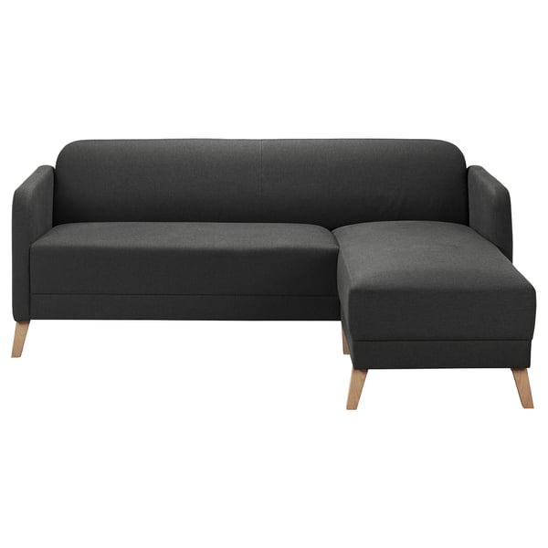 Modern dark grey l-shaped sofa, vissle fabric, wooden legs, clean lines.