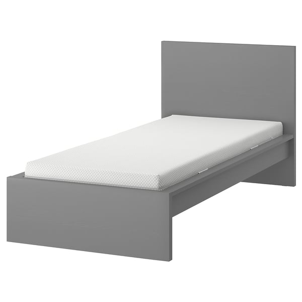 A grey MALM bed with a clean, minimalist design. It has a high headboard, adjustable bed sides, and a foam mattress.