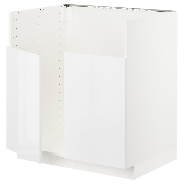 White kitchen cabinet from ikeas METOD series, featuring a glossy door and sturdy frame.