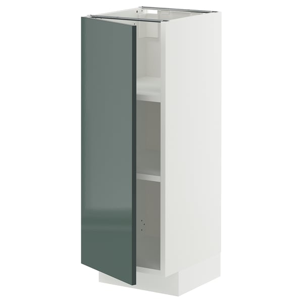 A vertical METOD cabinet with a high-gloss grey-green door and white frame, featuring a modern design and adjustable shelves.