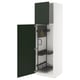 A white METOD kitchen cabinet with green doors and internal organisers.