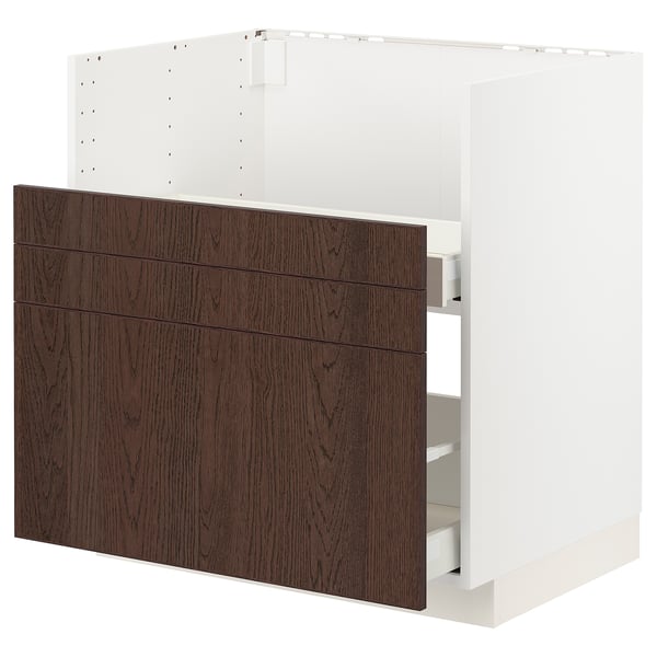 Modern white cabinet with dark brown wood drawers, sleek design.