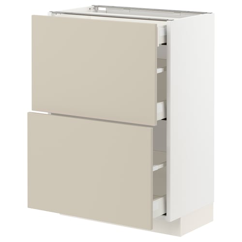 A METOD kitchen cabinet with beige havstorp fronts, featuring multiple drawers and a sleek, modern design.