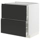 Modern black and white METOD kitchen unit with two drawers and sleek, handle-less design.