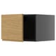 Modern kitchen cabinet with oak-textured door, dark interior.